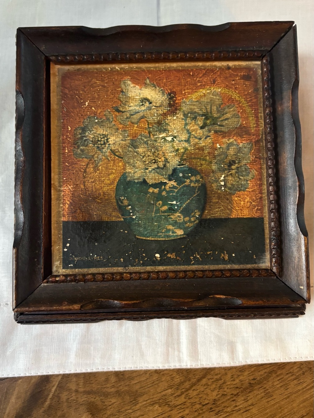 Vintage carved wooden jewelry or trinket box with floral design lid. Beautiful